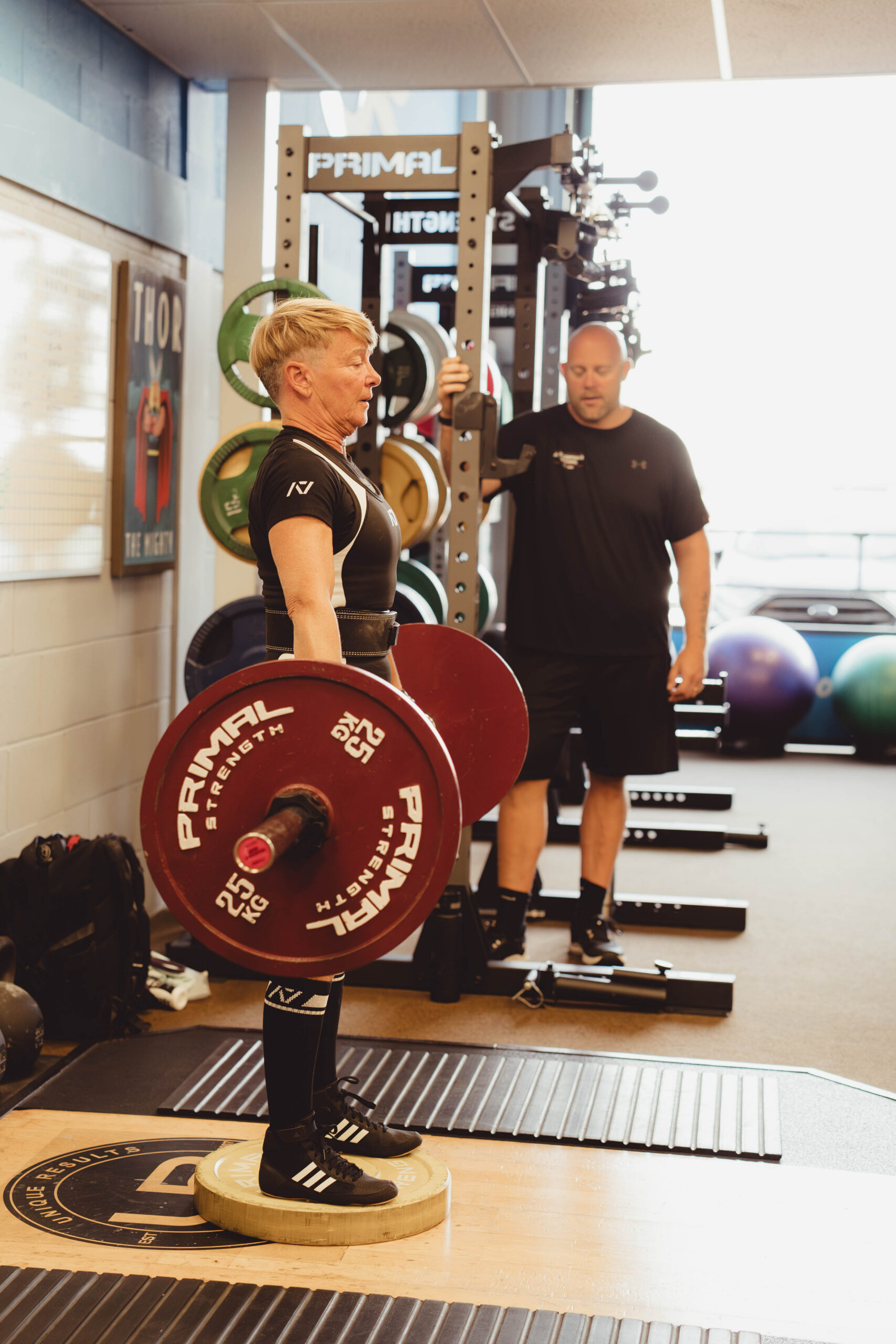 Strength athlete training with weights in a Chelmsford gym