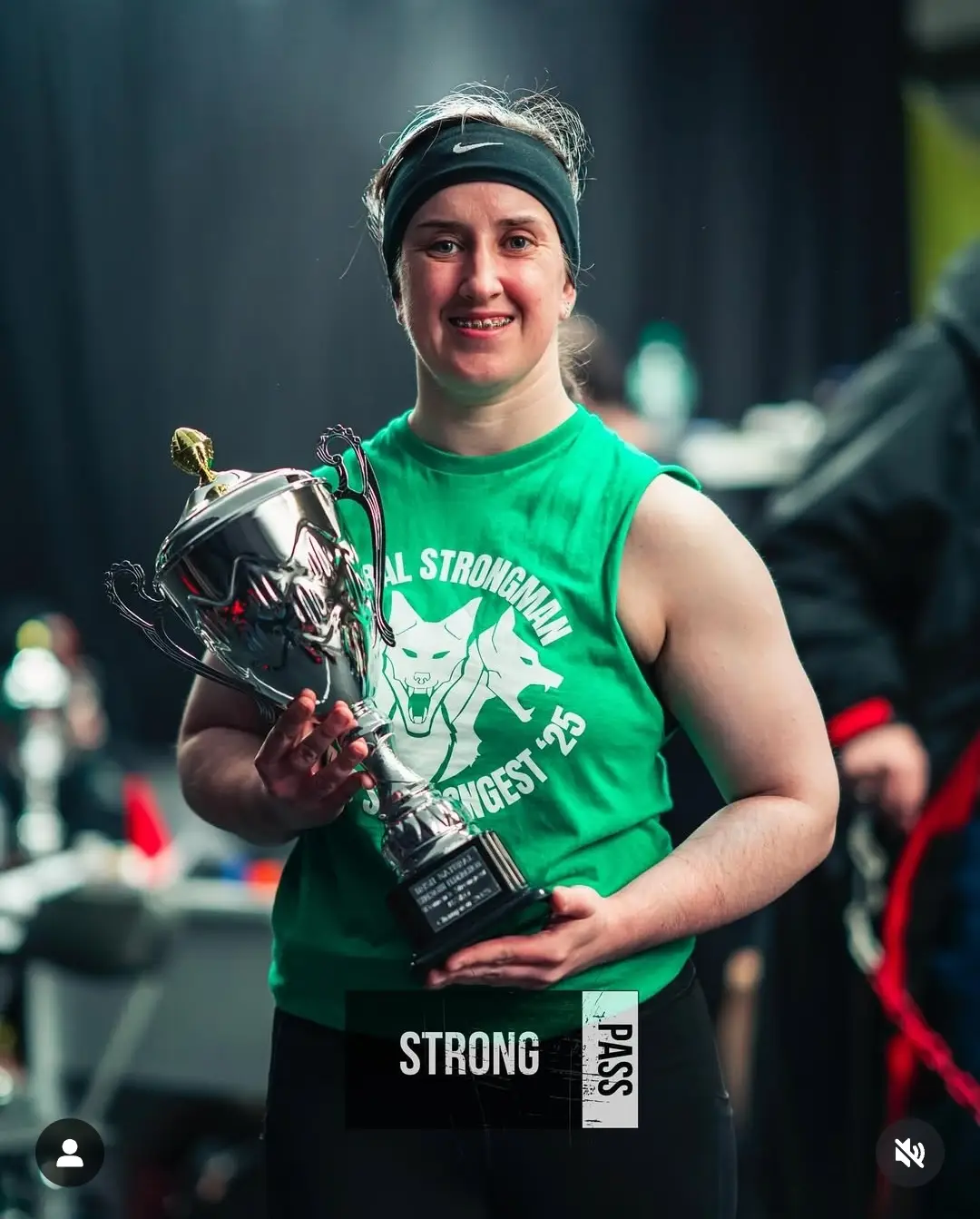 Strongman competitor posing during an event