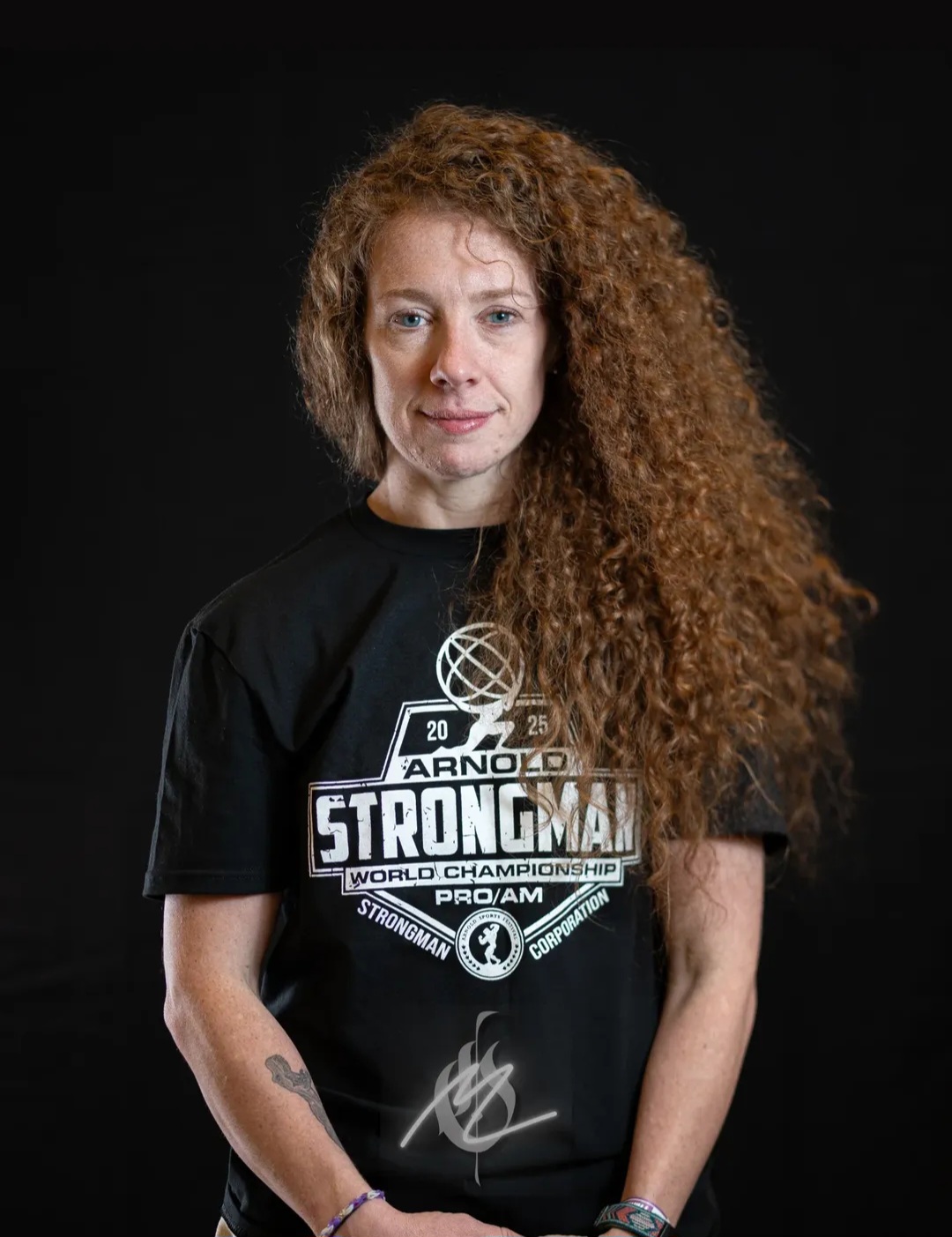 Female strength athlete posing for a portrait at the Arnold Strongman world championship
